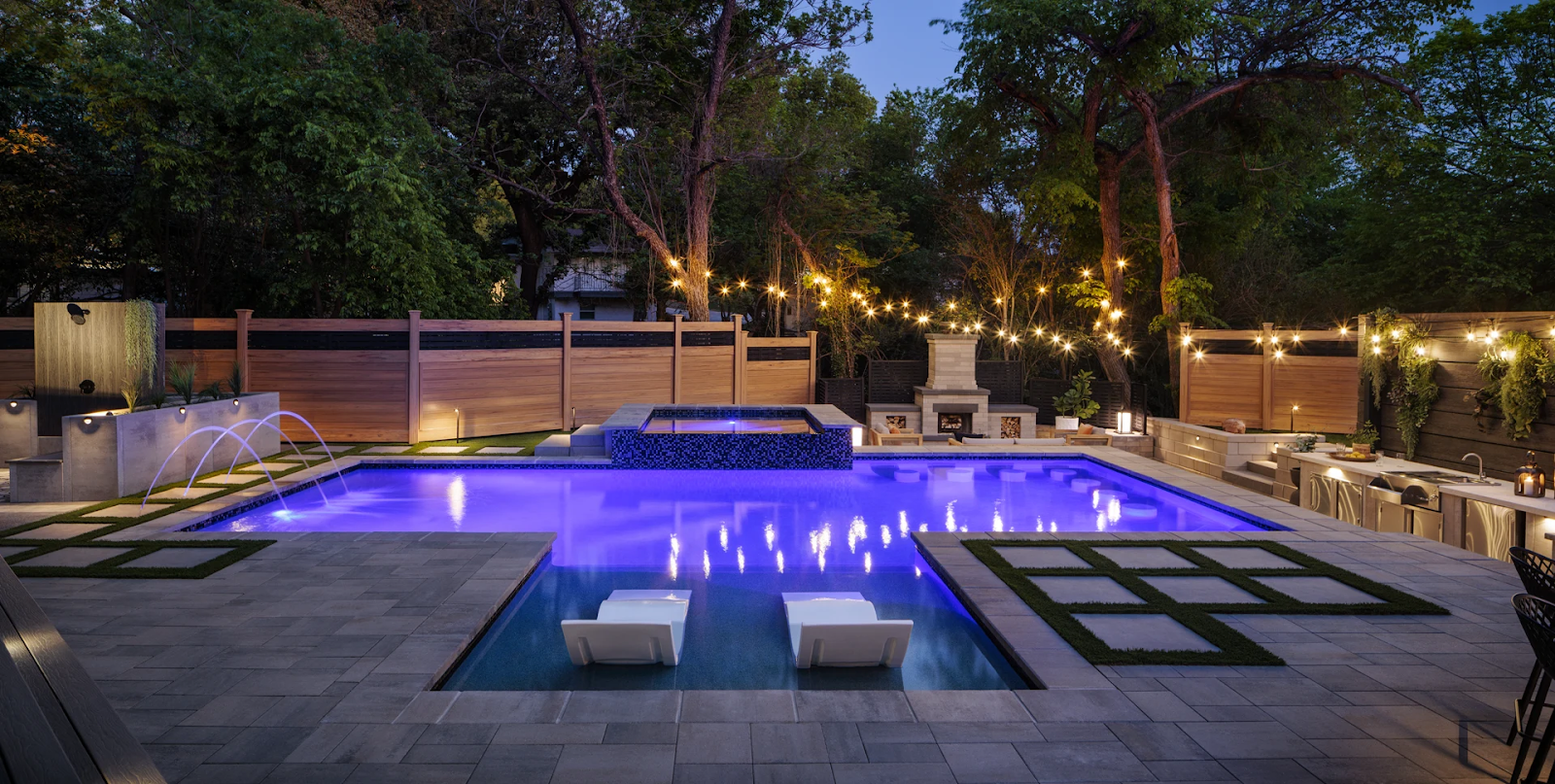 Light Bronze aluminum fence with ornamental top rail, surrounding a landscaped residential yard in Charlotte, NC